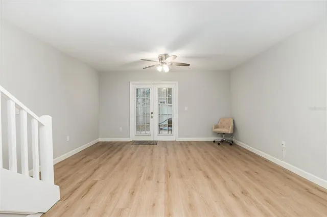 a kitchen with stainless steel appliances kitchen island a refrigerator sink and microwave