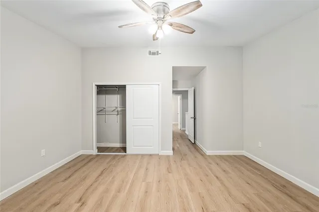 a bathroom with a sink vanity and a mirror