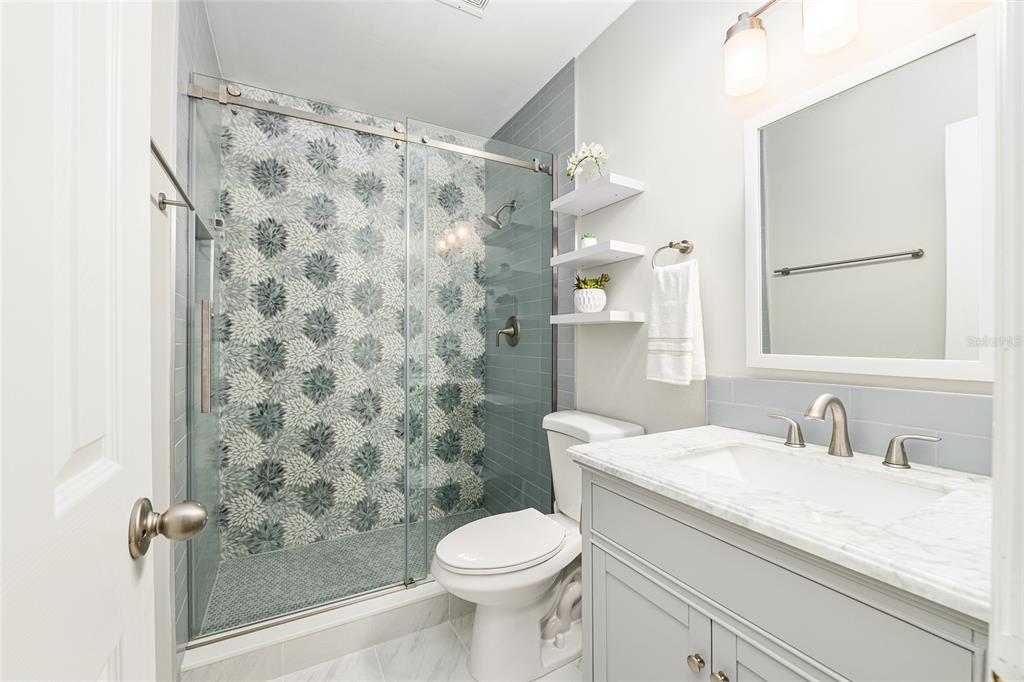 5240 Southwest 92nd Court Gainesville, FL 32608 - Photo 37 of 58 a bathroom with a sink toilet and shower