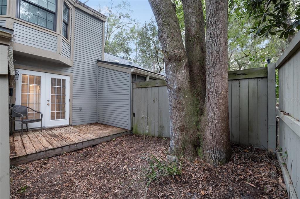 5240 Southwest 92nd Court Gainesville, FL 32608 - Photo 52 of 58 a view of a backyard of the house