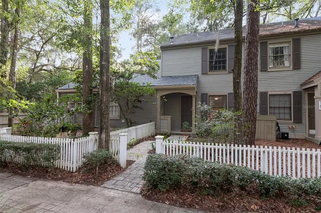 a view of a door and a window