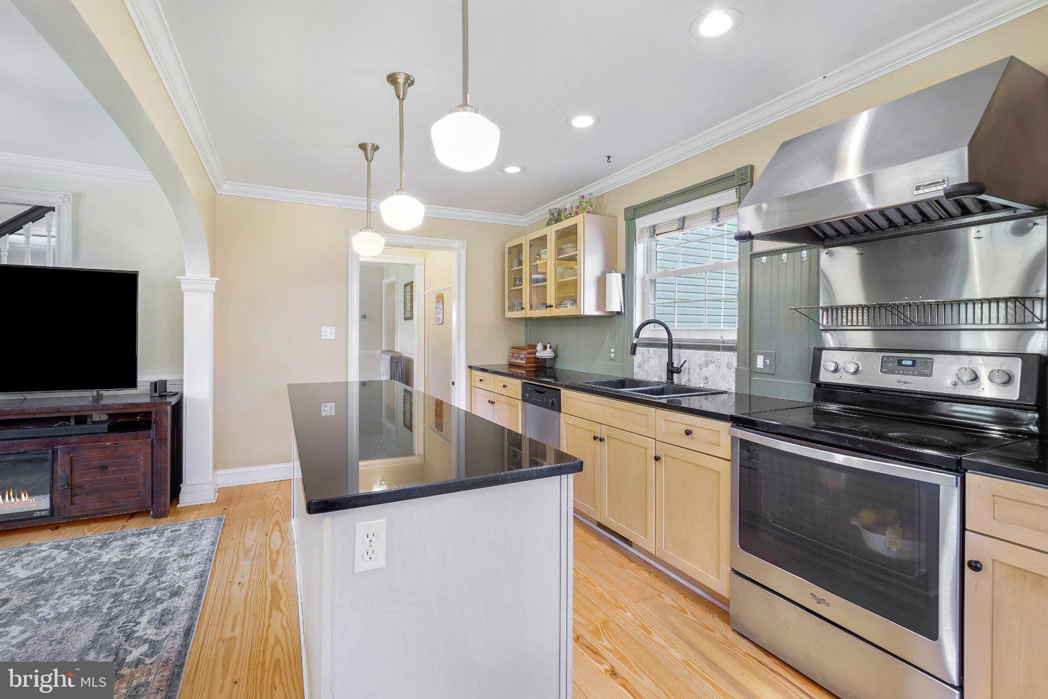 8446 Turnbull Road Warrenton, VA 20186 - Photo 18 of 39 Modern kitchen with sleek finishes.