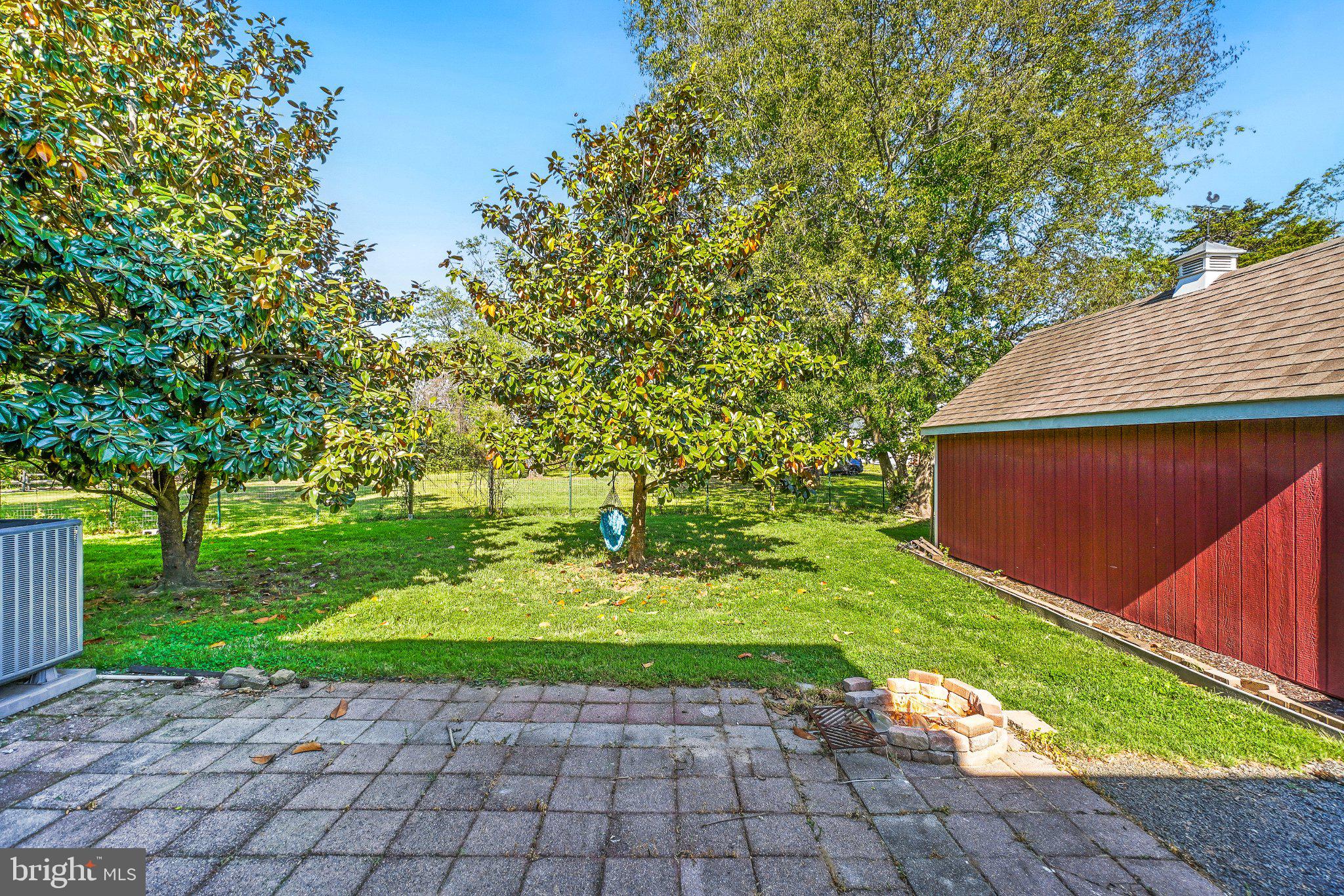 8446 Turnbull Road Warrenton, VA 20186 - Photo 7 of 39 Serene backyard with lush greenery.