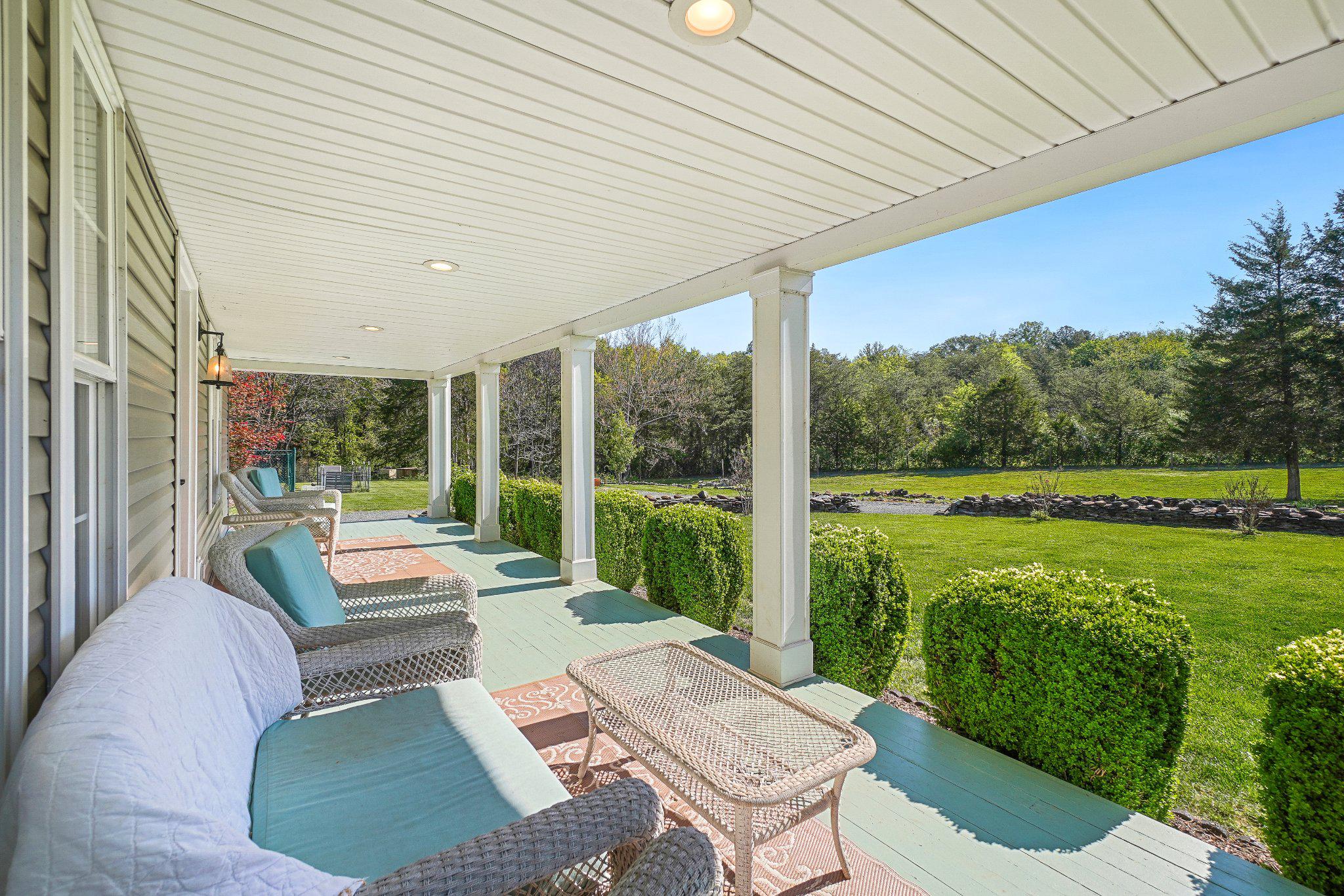 8446 Turnbull Road Warrenton, VA 20186 - Photo 9 of 39 Large Front Porch with morning sunshine