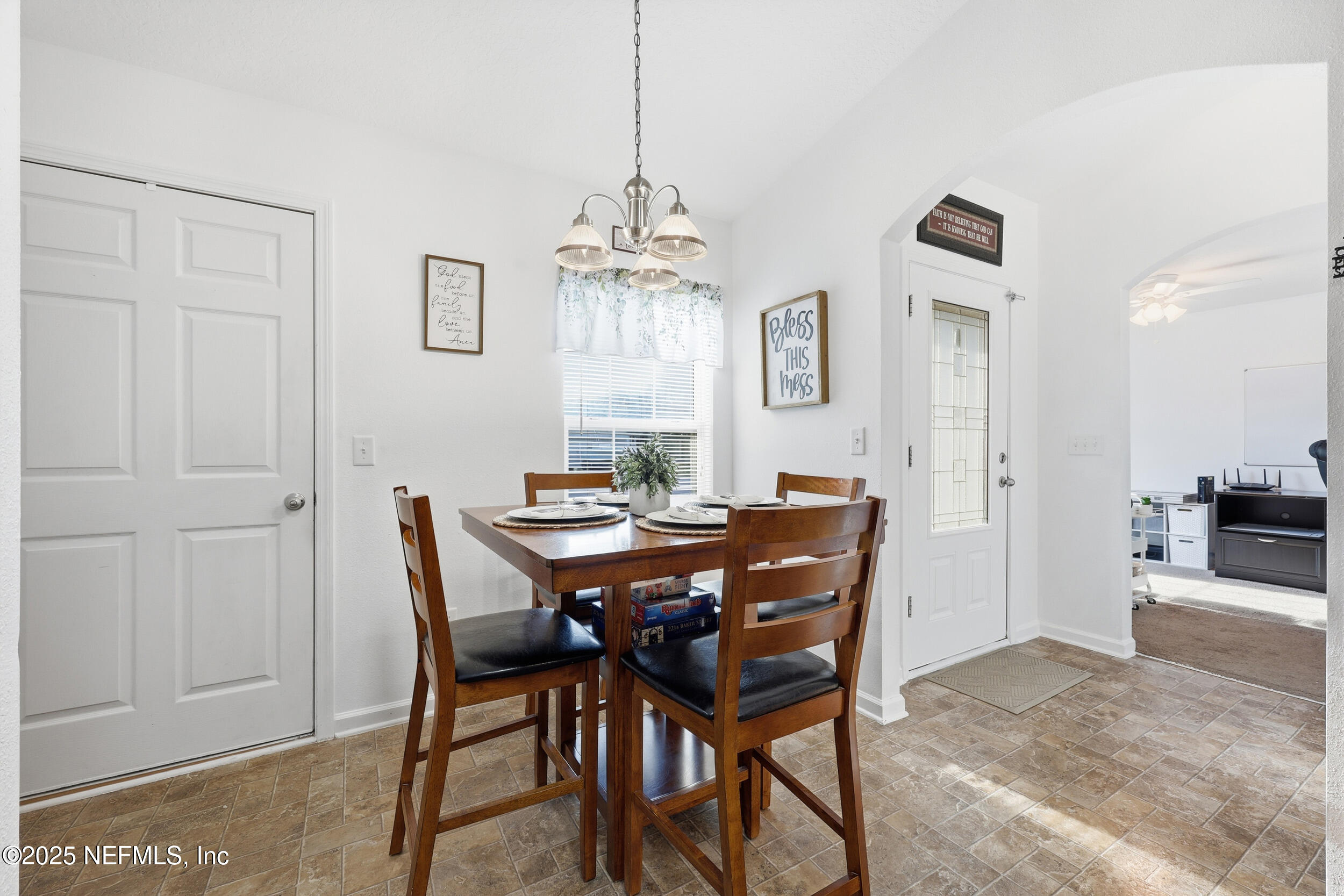 131 North Twin Maple Road St. Augustine, FL 32084 - Photo 13 of 55 a view of a dining room with furniture