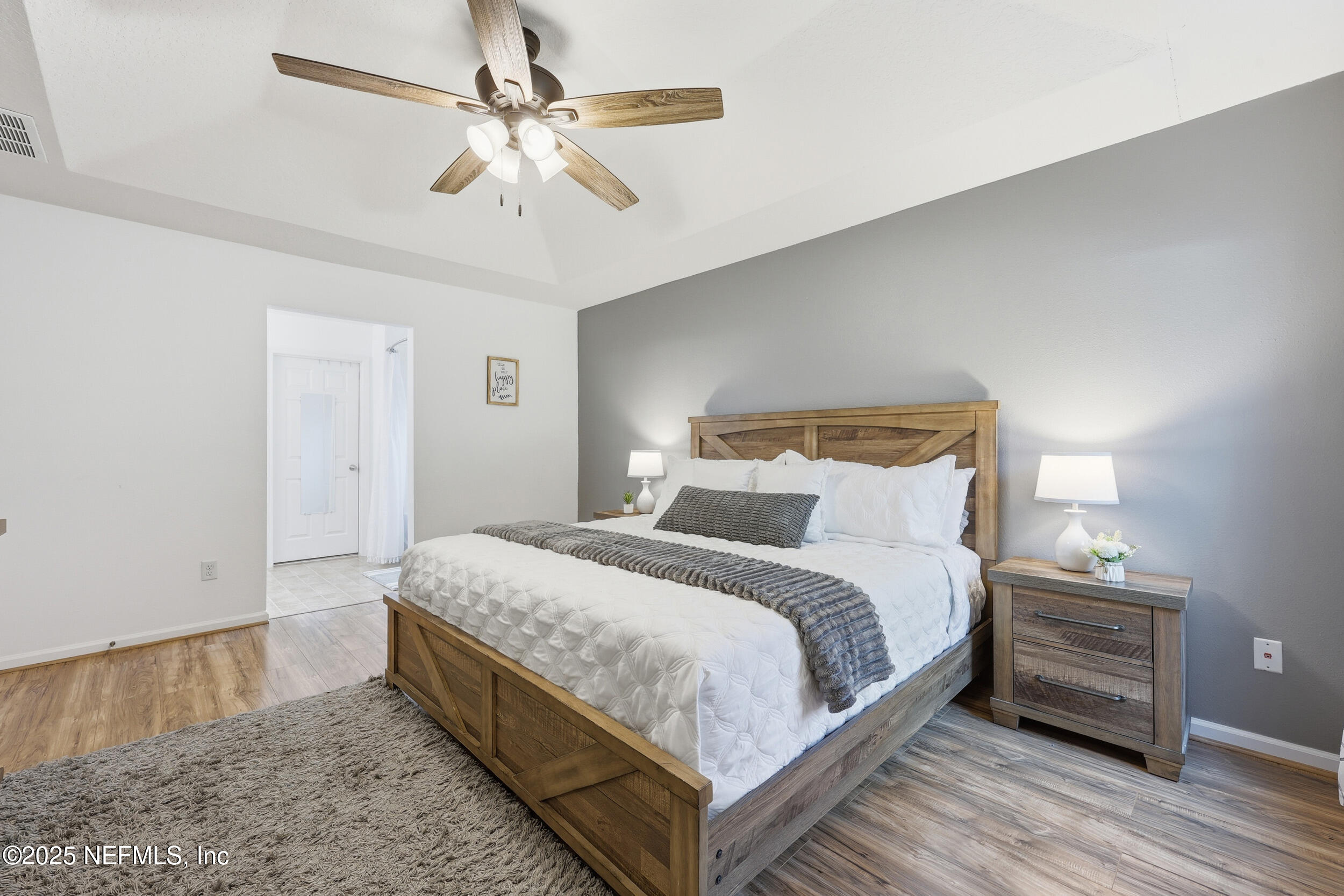 131 North Twin Maple Road St. Augustine, FL 32084 - Photo 16 of 55 a spacious bedroom with a bed and a ceiling fan