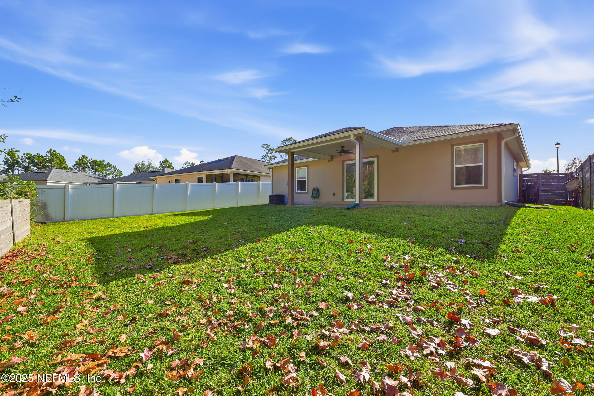 131 North Twin Maple Road St. Augustine, FL 32084 - Photo 41 of 55 a view of a house with a big yard