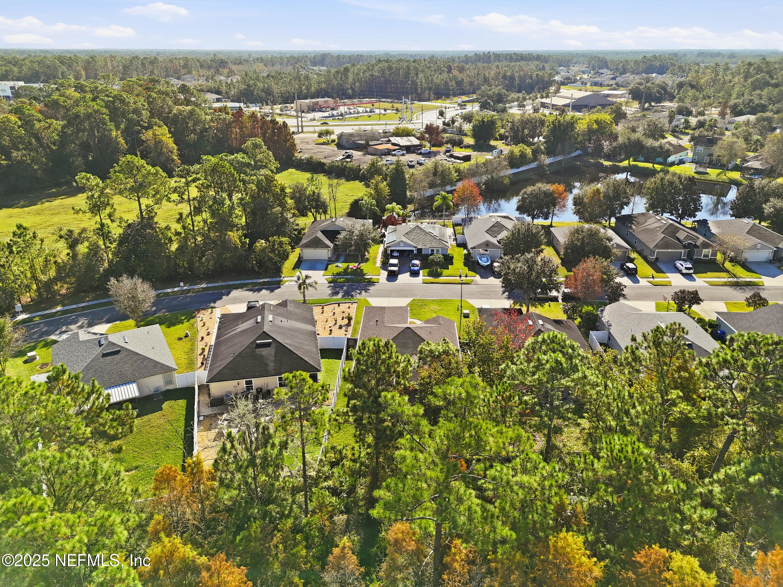 131 North Twin Maple Road St. Augustine, FL 32084 - Photo 49 of 55 an aerial view of residential houses with outdoor space and swimming pool