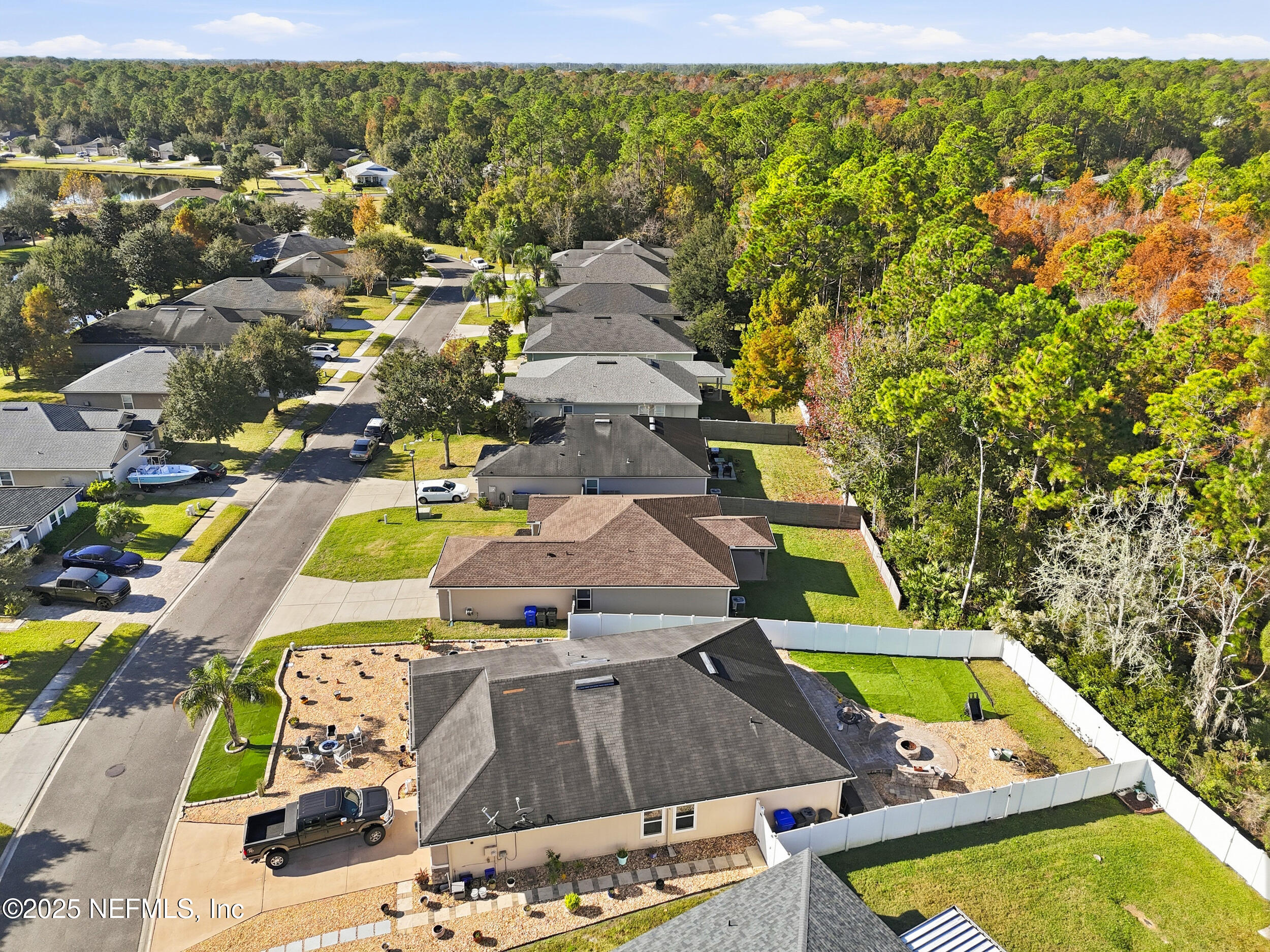 131 North Twin Maple Road St. Augustine, FL 32084 - Photo 50 of 55 an aerial view of a house with a swimming pool