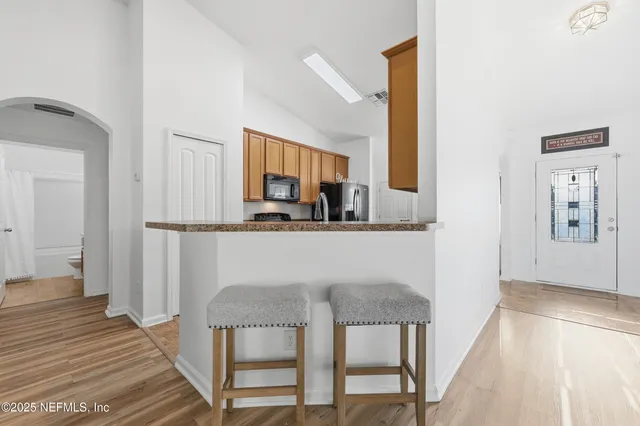 a view of a dining room with furniture