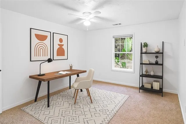 a workspace with a table and a window