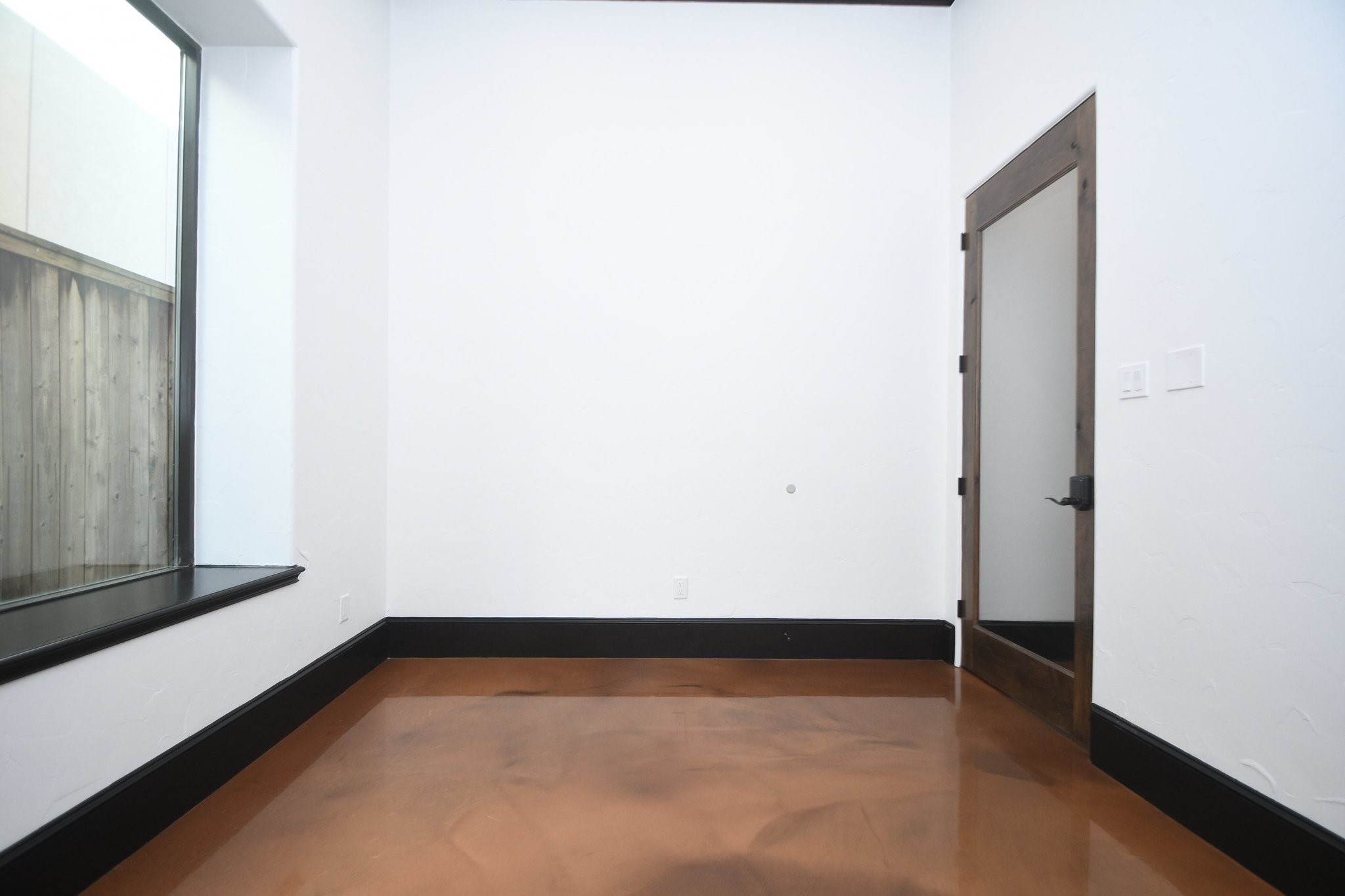 4119 Allen Street Houston, TX 77007 - Photo 15 of 50 a view of a room with wooden floor and a window