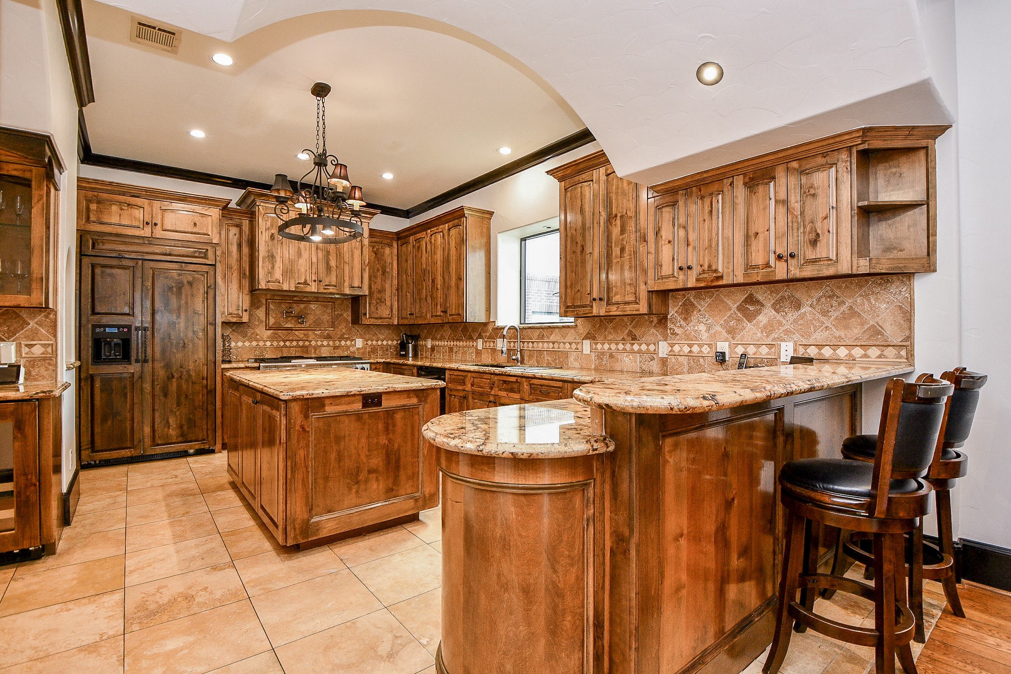 4119 Allen Street Houston, TX 77007 - Photo 25 of 50 a kitchen with stainless steel appliances granite countertop a sink and a refrigerator