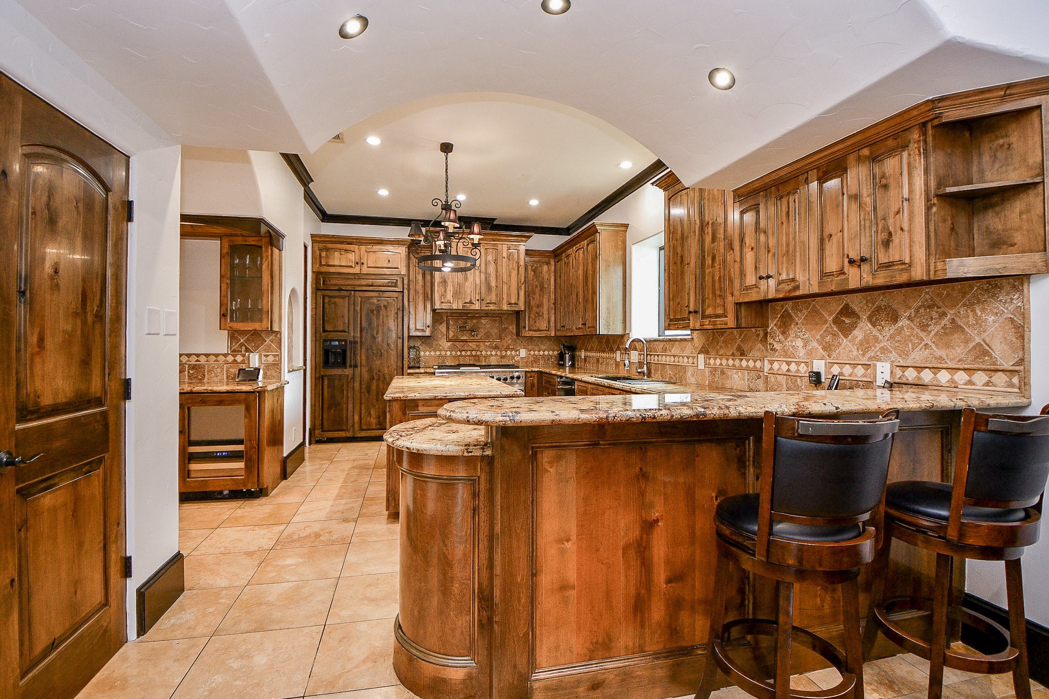 4119 Allen Street Houston, TX 77007 - Photo 26 of 50 a kitchen with stainless steel appliances granite countertop a sink stove and refrigerator