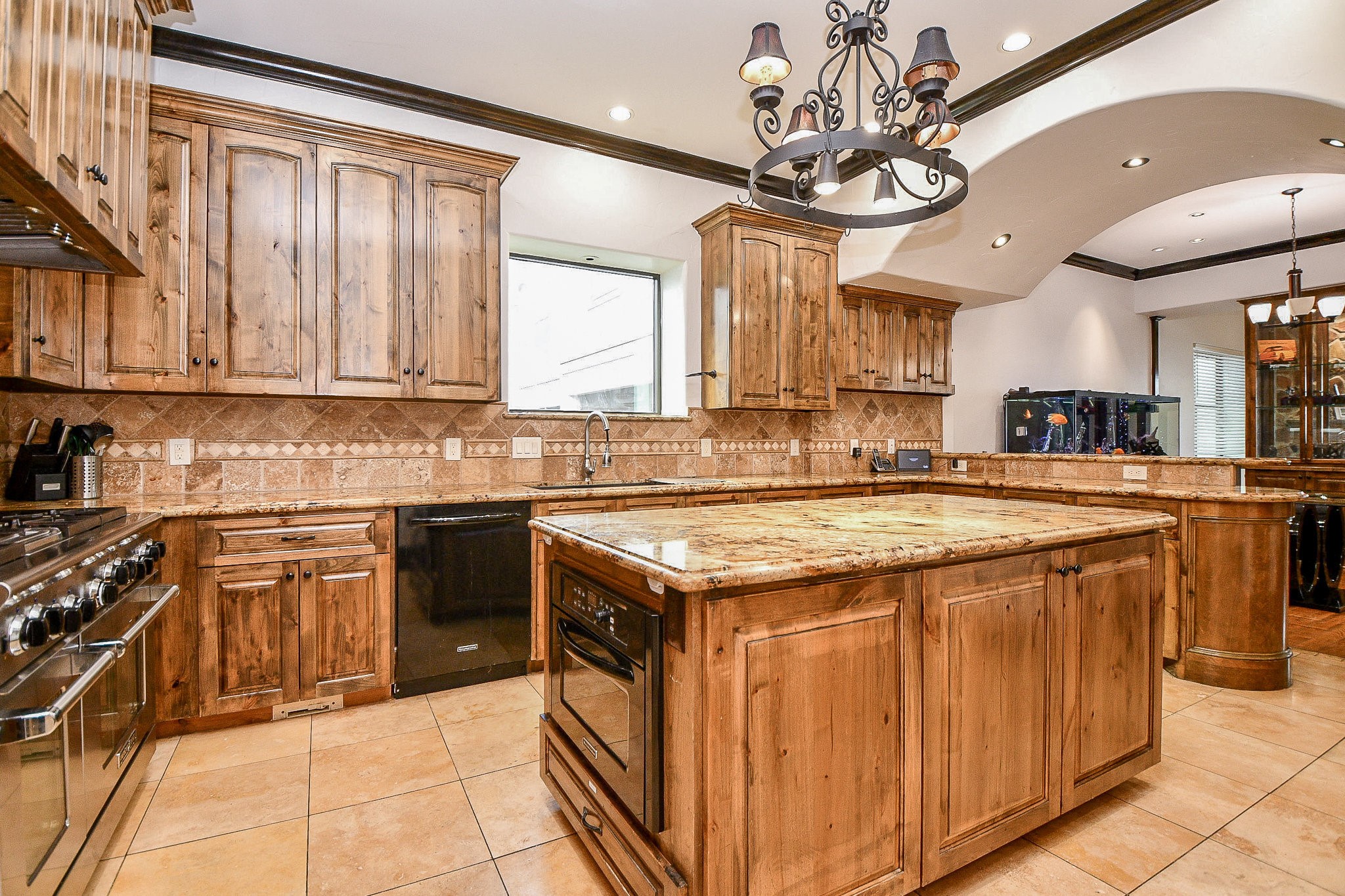 4119 Allen Street Houston, TX 77007 - Photo 27 of 50 a kitchen with stainless steel appliances granite countertop a stove a sink dishwasher and a refrigerator