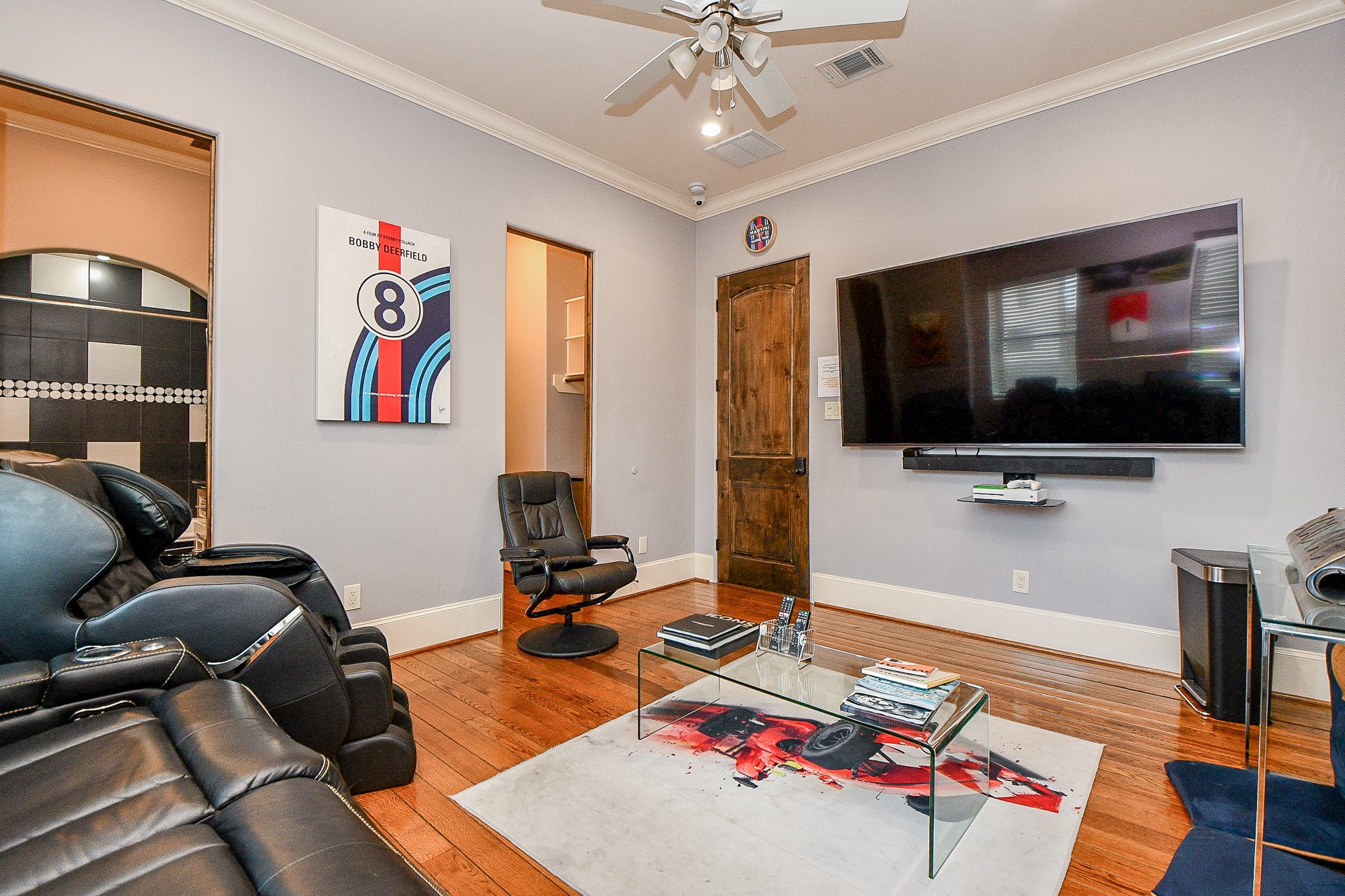 4119 Allen Street Houston, TX 77007 - Photo 39 of 50 a living room with furniture and a flat screen tv