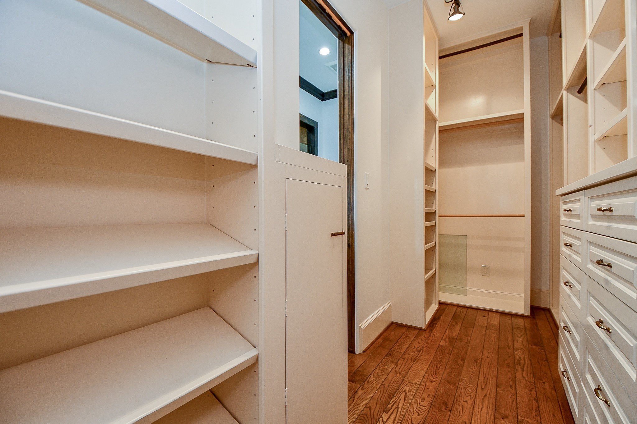 4119 Allen Street Houston, TX 77007 - Photo 45 of 50 a view of walk in closet with empty racks