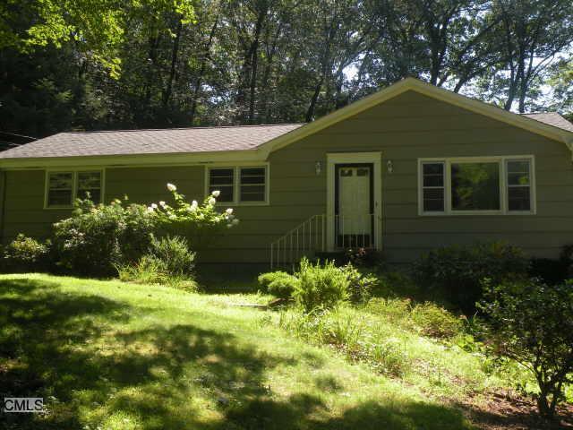 55 Blue Ridge Drive Trumbull, CT 06611 - Photo 1 of 1 a front view of a house with a yard
