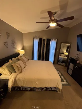 a large bathroom with a double vanity sink and mirror