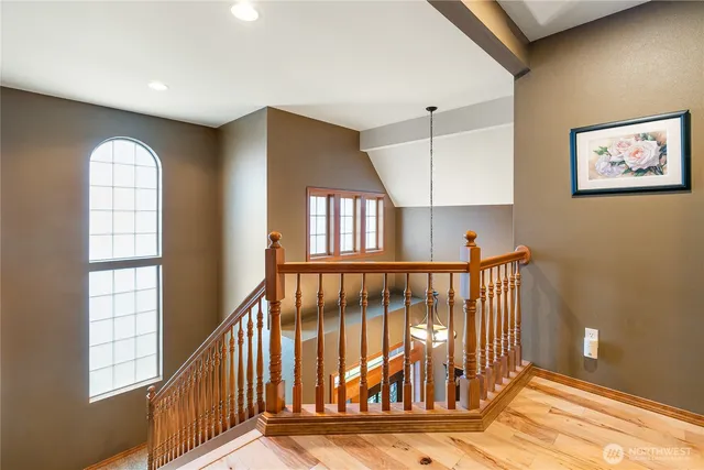 a view of entryway with wooden floor