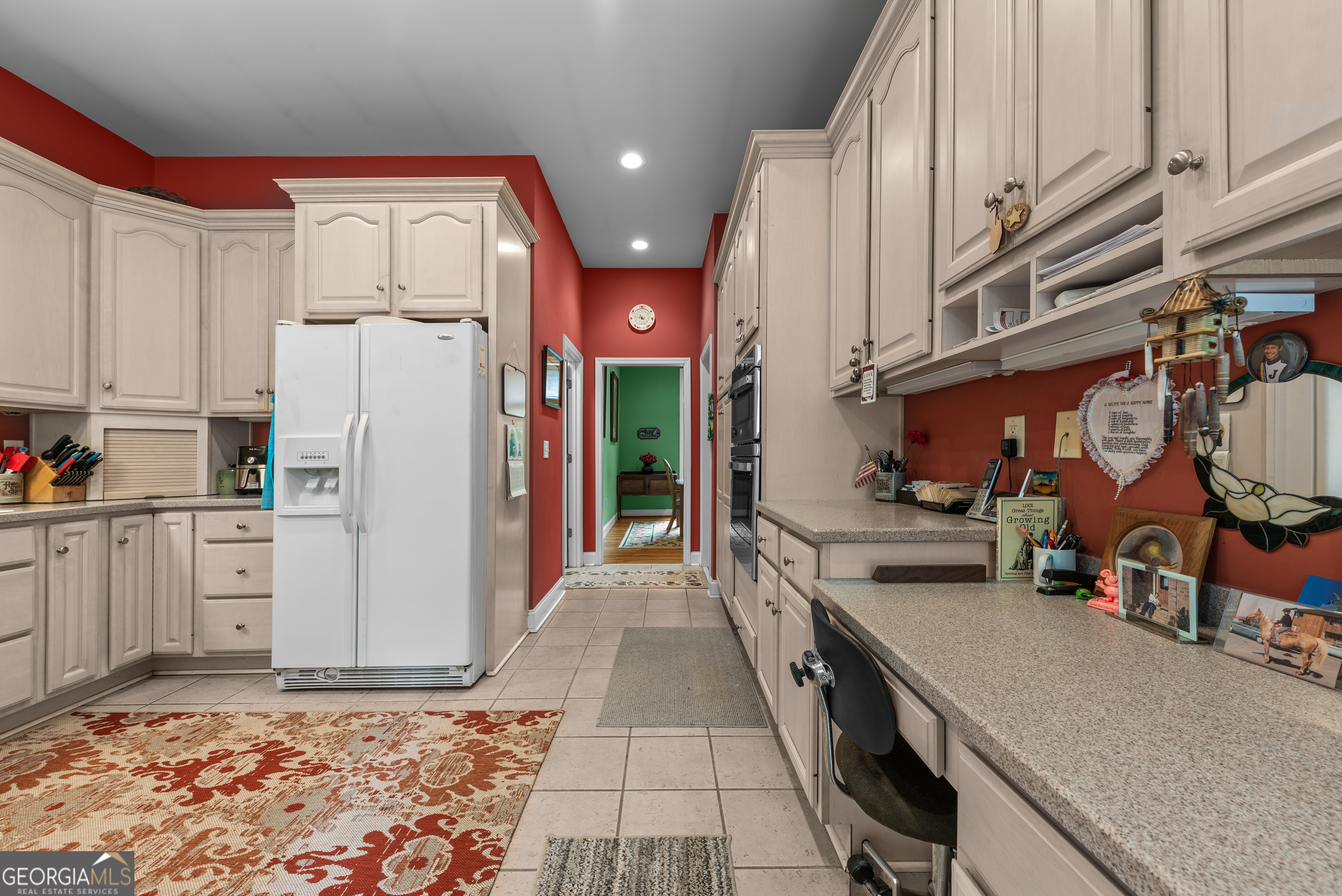 1370 Deerwood Drive Rutledge, GA 30663 - Photo 16 of 43 a kitchen with stainless steel appliances granite countertop a refrigerator and a stove