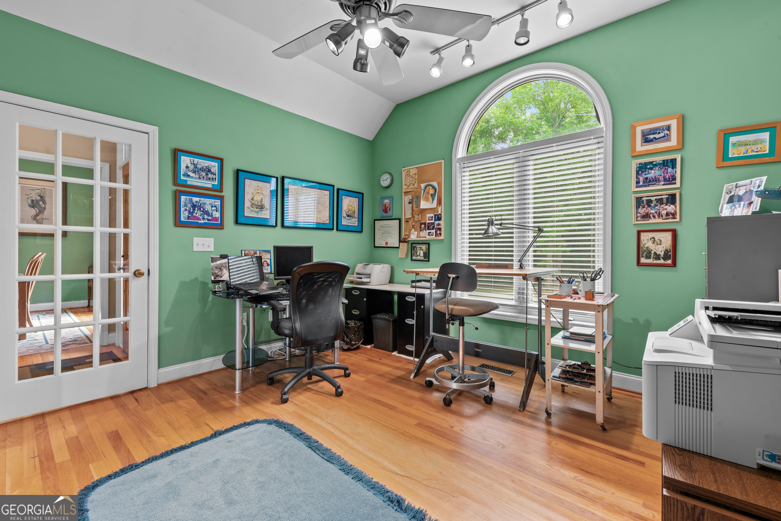 1370 Deerwood Drive Rutledge, GA 30663 - Photo 23 of 43 a view of a livingroom with workspace and a window