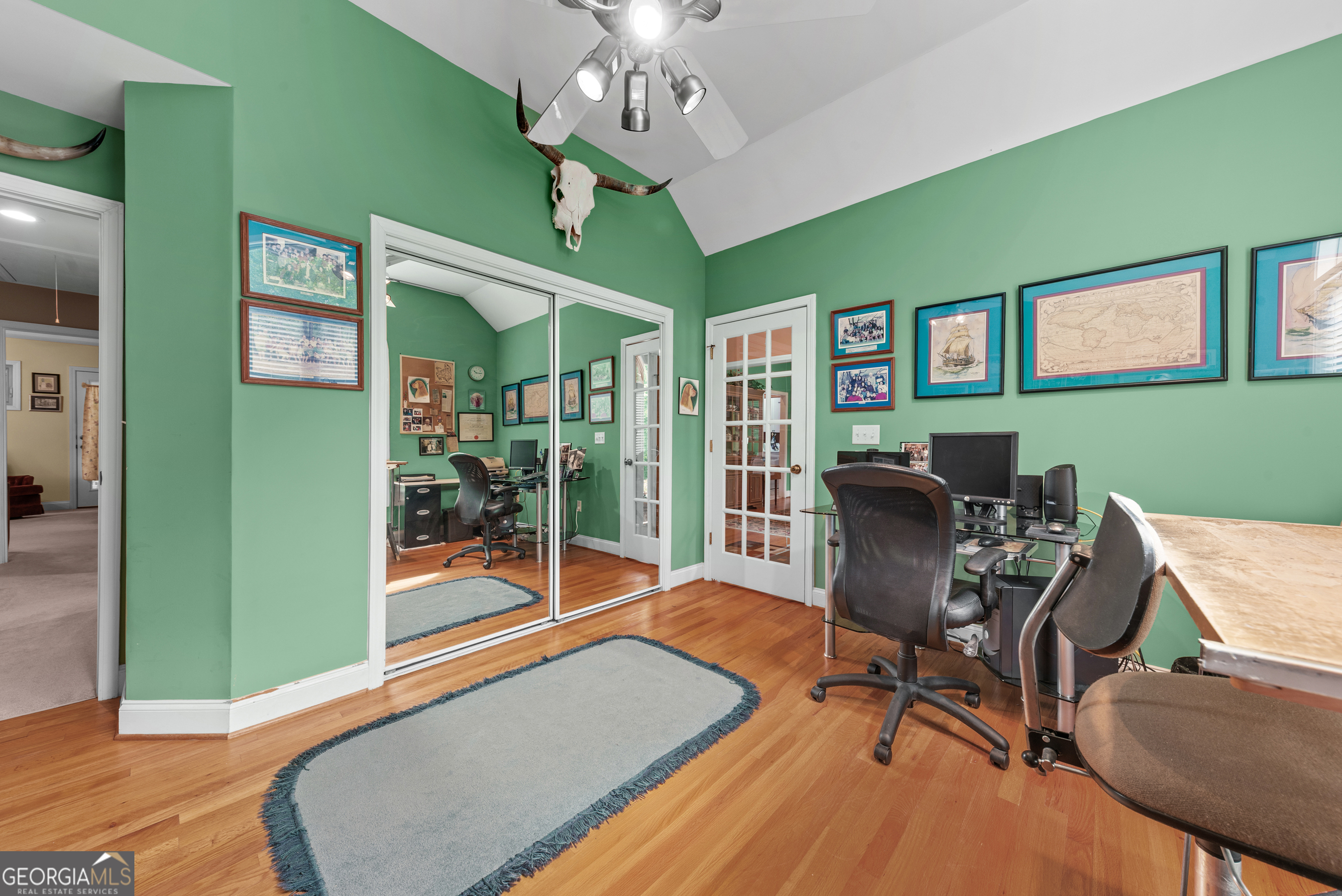 1370 Deerwood Drive Rutledge, GA 30663 - Photo 24 of 43 a living room with furniture and a chandelier
