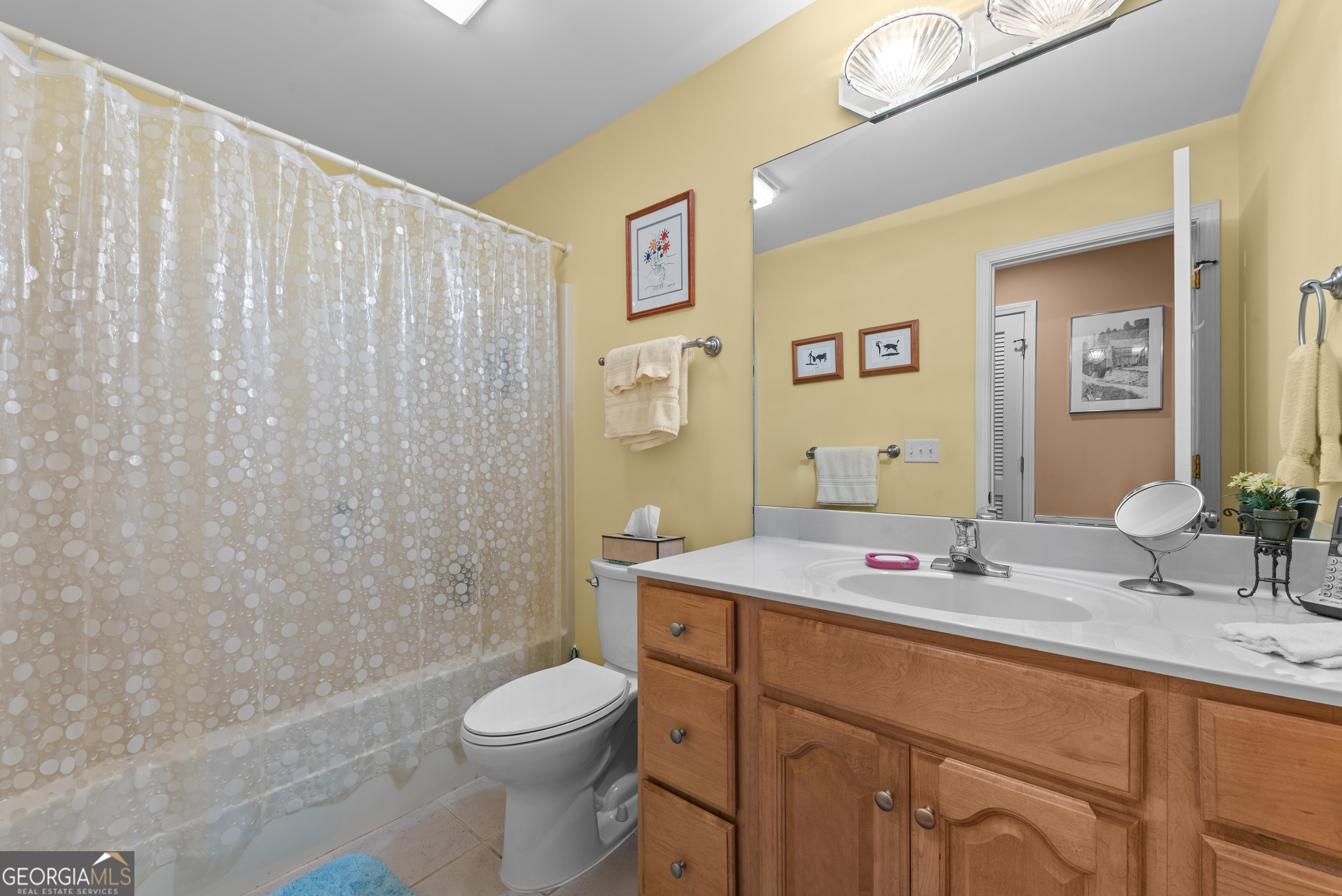 1370 Deerwood Drive Rutledge, GA 30663 - Photo 25 of 43 a bathroom with a granite countertop sink toilet and shower