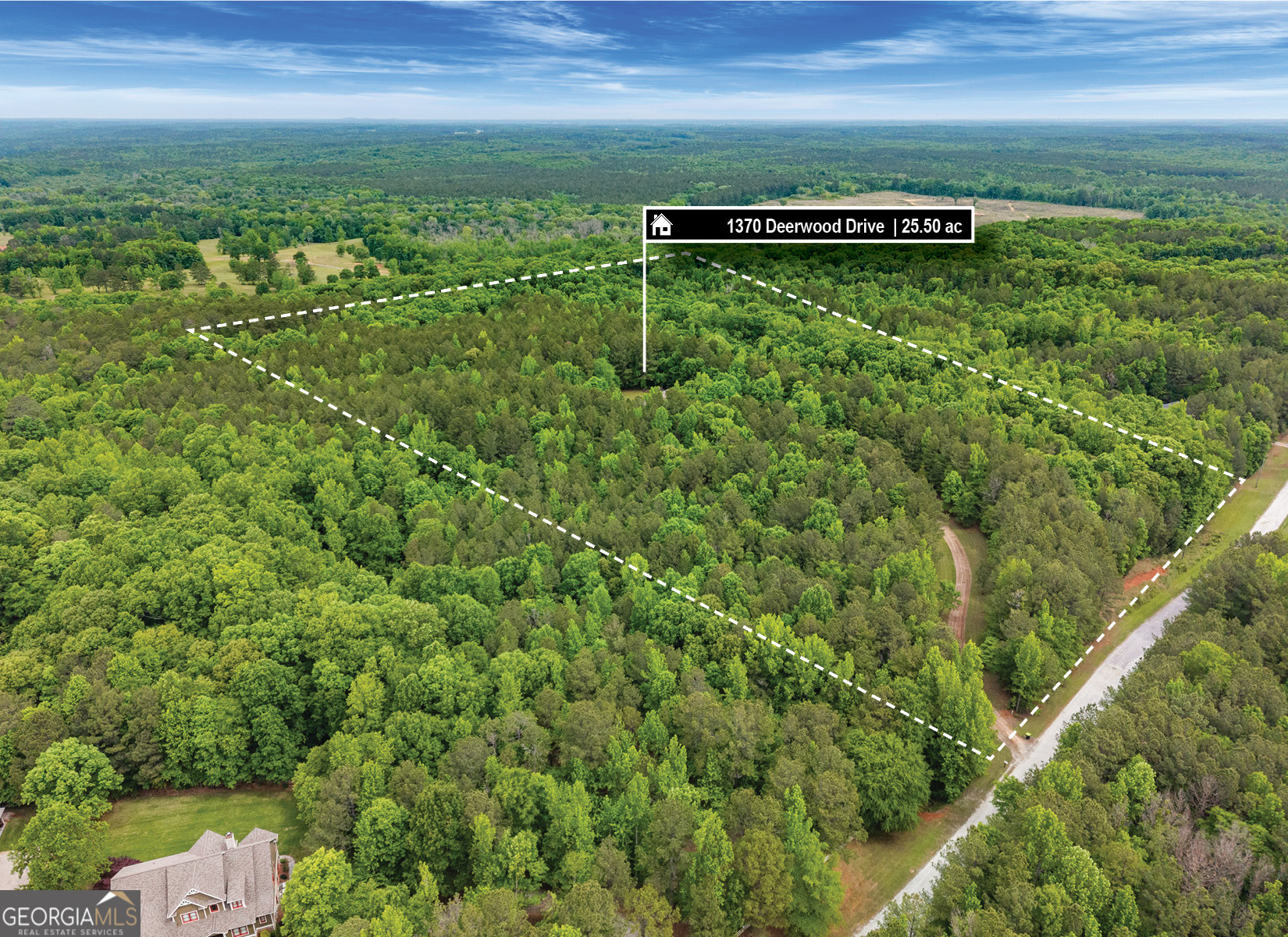 1370 Deerwood Drive Rutledge, GA 30663 - Photo 42 of 43 a view of a green field with lots of bushes