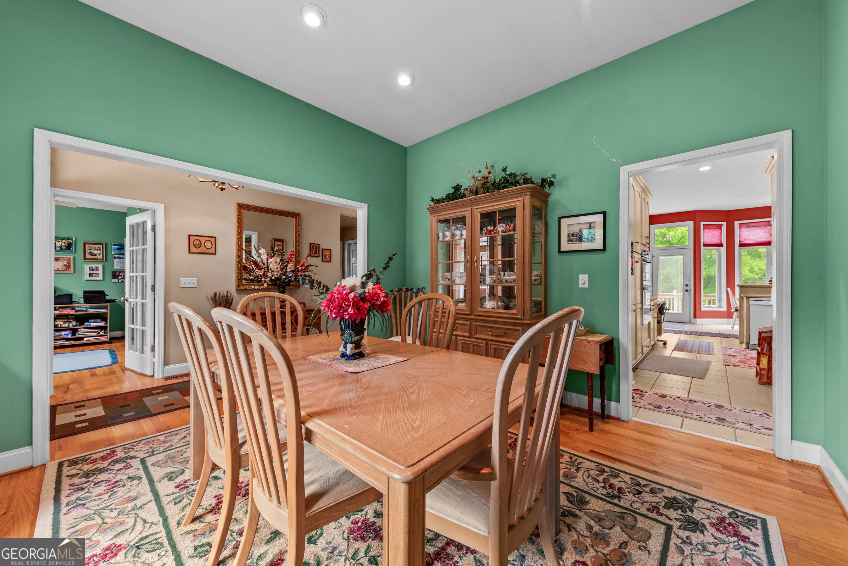 1370 Deerwood Drive Rutledge, GA 30663 - Photo 7 of 43 a view of a dining room with furniture window and wooden floor