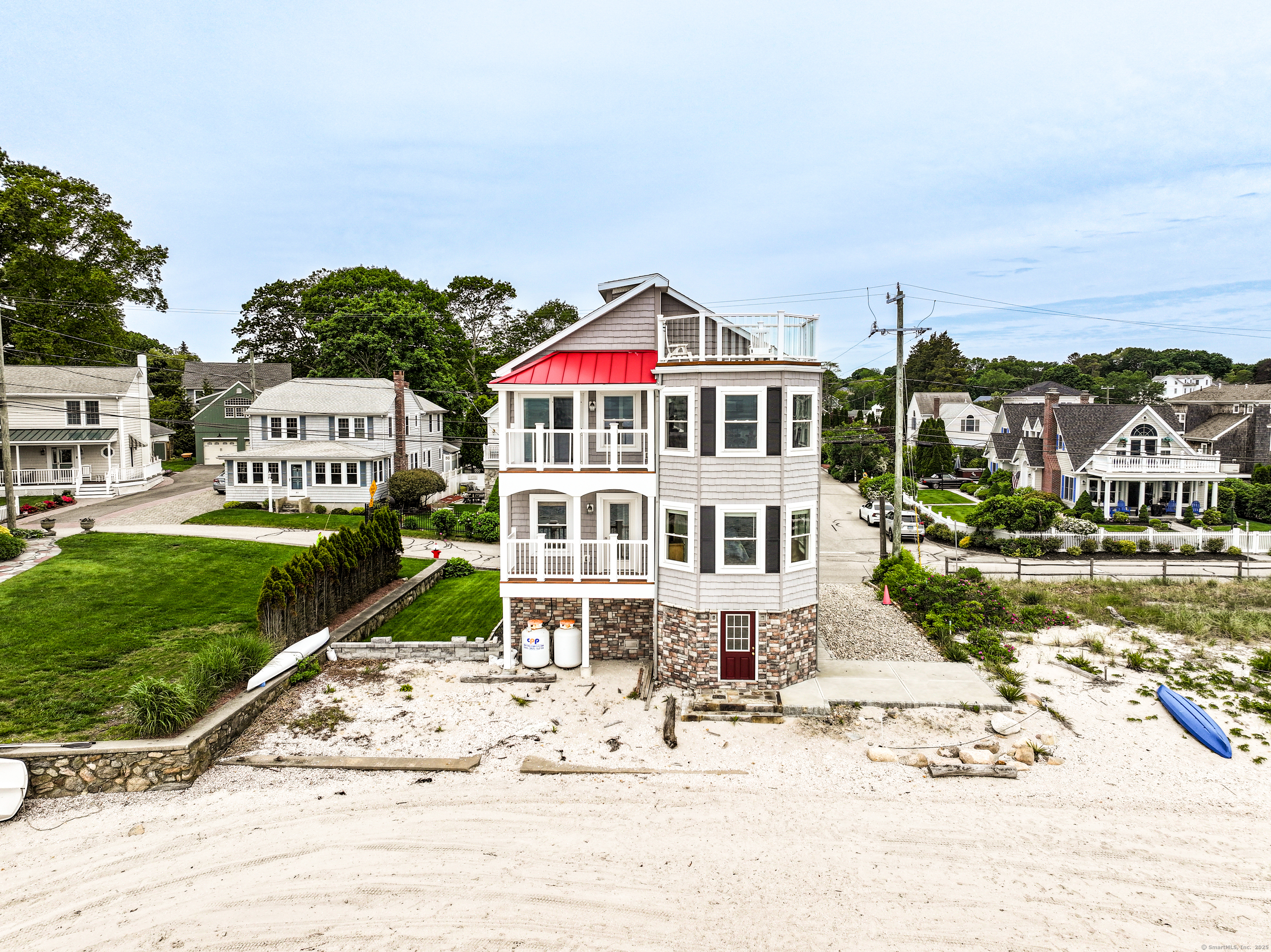 22 Shore Road East Lyme, CT 06357 - Photo 1 of 1 a front view of a house with a yard