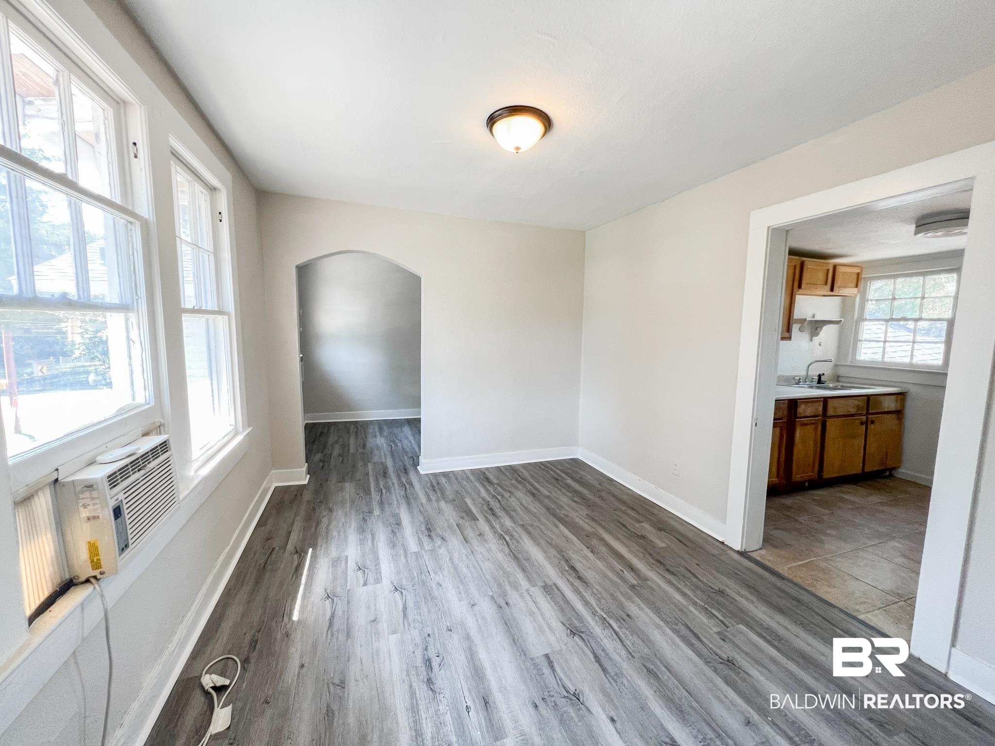 5 North Fulton Street Mobile, AL 36607 - Photo 19 of 55 Unfurnished with cooling unit, and light hardwood / wood-style flooring