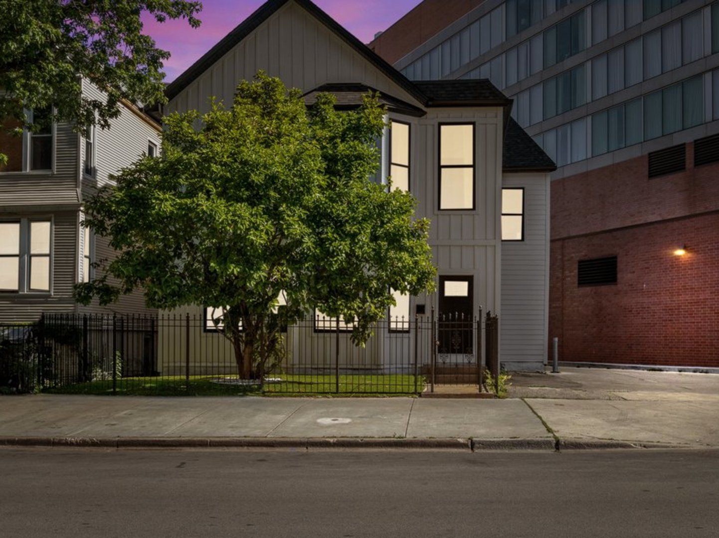 a view of a house with a street