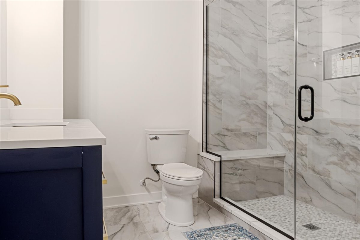 1110 West Addison Street Chicago, IL 60613 - Photo 16 of 49 a bathroom with a toilet and a sink