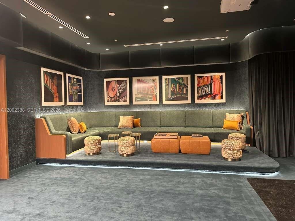 77 Southeast 5th Street, Unit 1208 Miami, FL 33131 - Photo 13 of 32 a living room with furniture