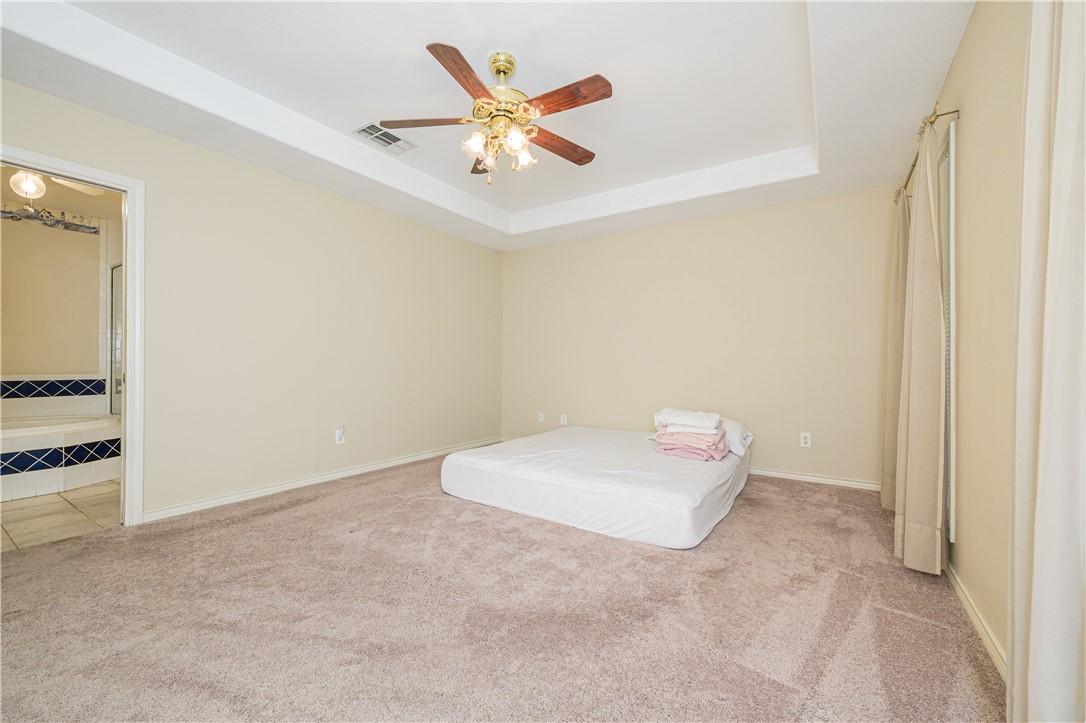 10416 7th Street Pettus, TX 78146 - Photo 27 of 40 an empty room with closet and ceiling fan
