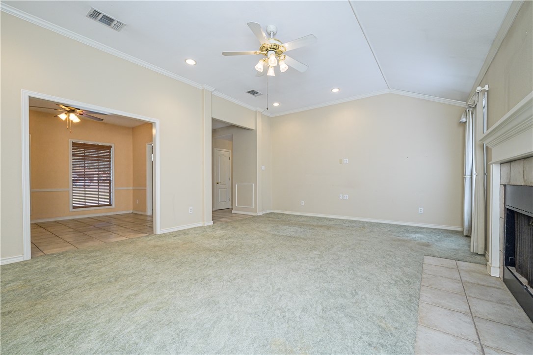 10416 7th Street Pettus, TX 78146 - Photo 8 of 40 a view of an empty room with a fireplace