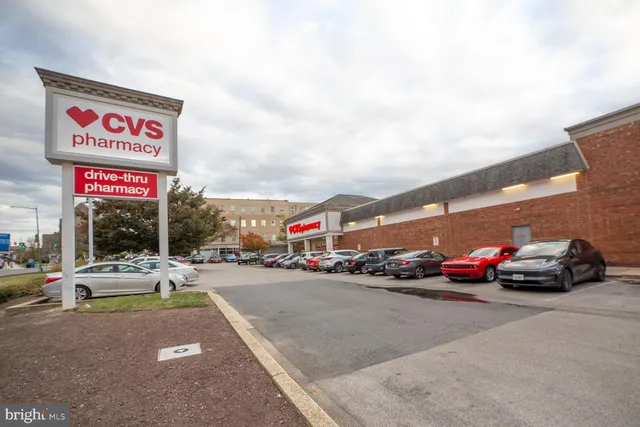 a view of street with parked cars