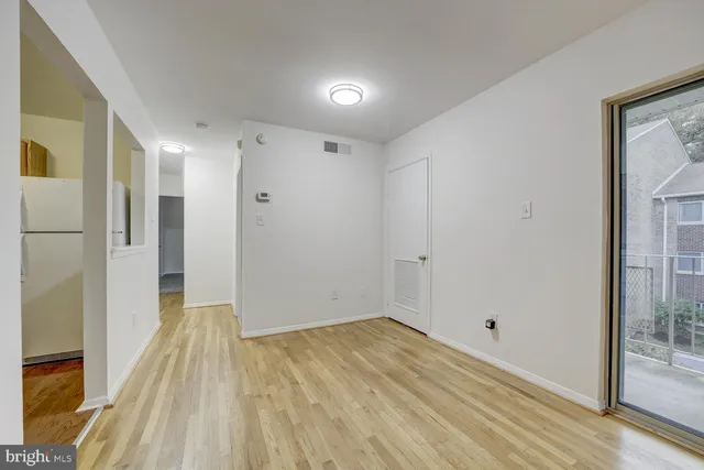 a view of livingroom with wooden floor