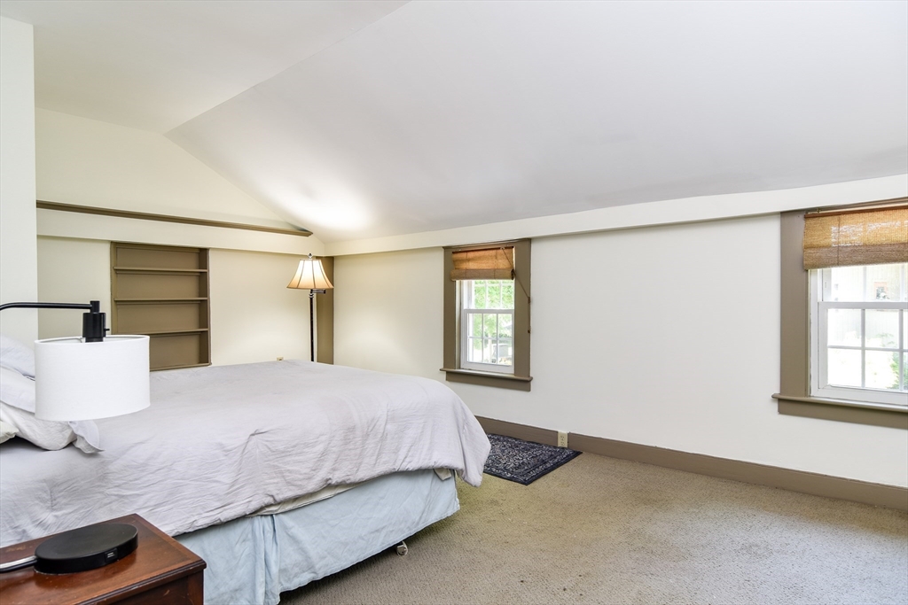 33 Grove Street Framingham, MA 01701 - Photo 22 of 33 a bedroom with a bed and a window