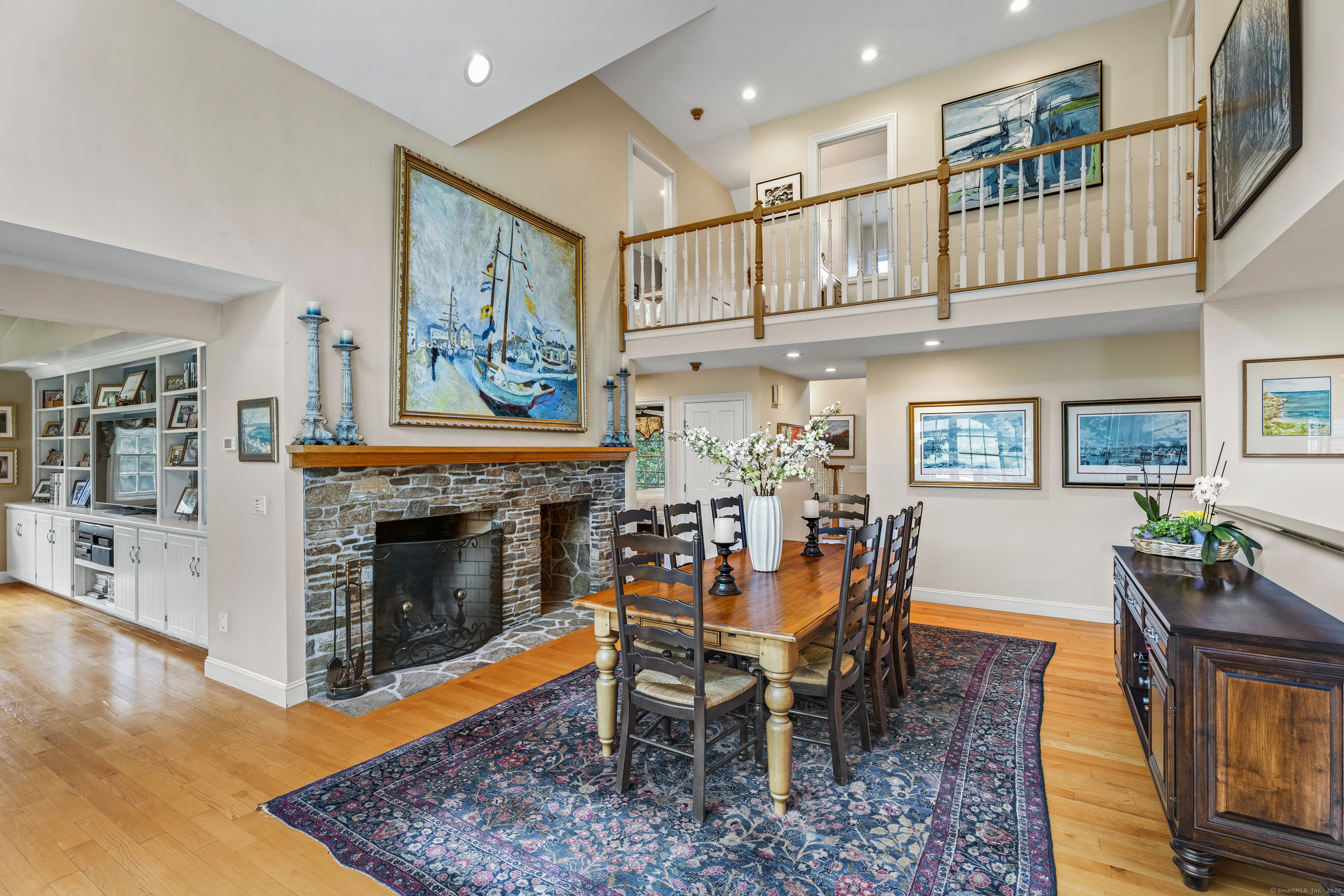 57 Northwest Corner Road Preston, CT 06365 - Photo 12 of 40 a dining room with furniture a fireplace and wooden floor