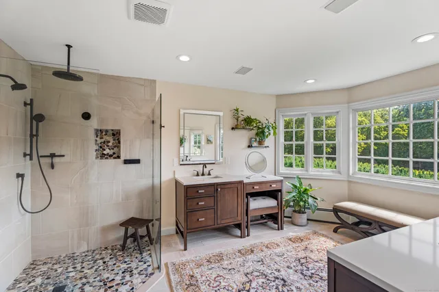 a workspace with furniture and window