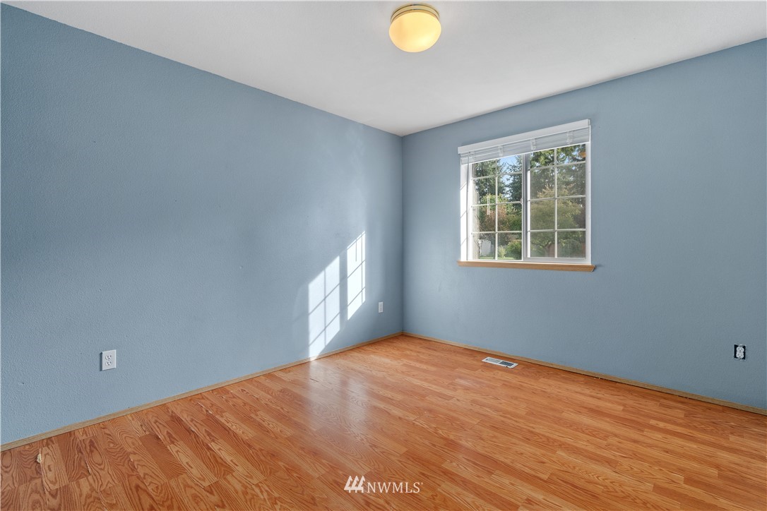 5418 187th Court Southwest Rochester, WA 98579 - Photo 13 of 24 a view of an empty room with a window
