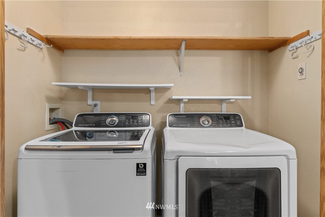 5418 187th Court Southwest Rochester, WA 98579 - Photo 16 of 24 a utility room with dryer and washer