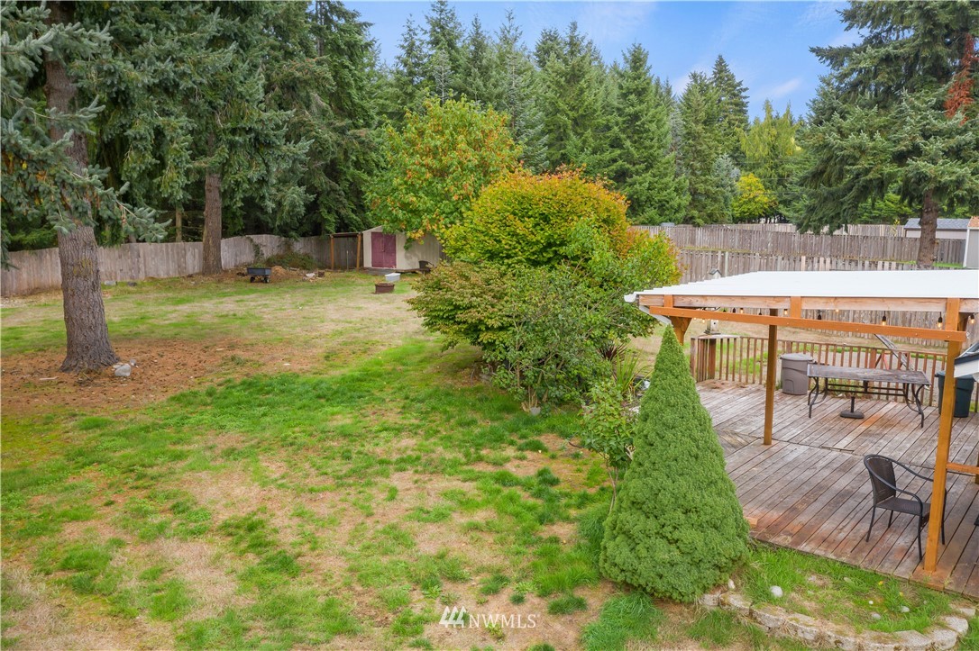 5418 187th Court Southwest Rochester, WA 98579 - Photo 19 of 24 a view of a backyard