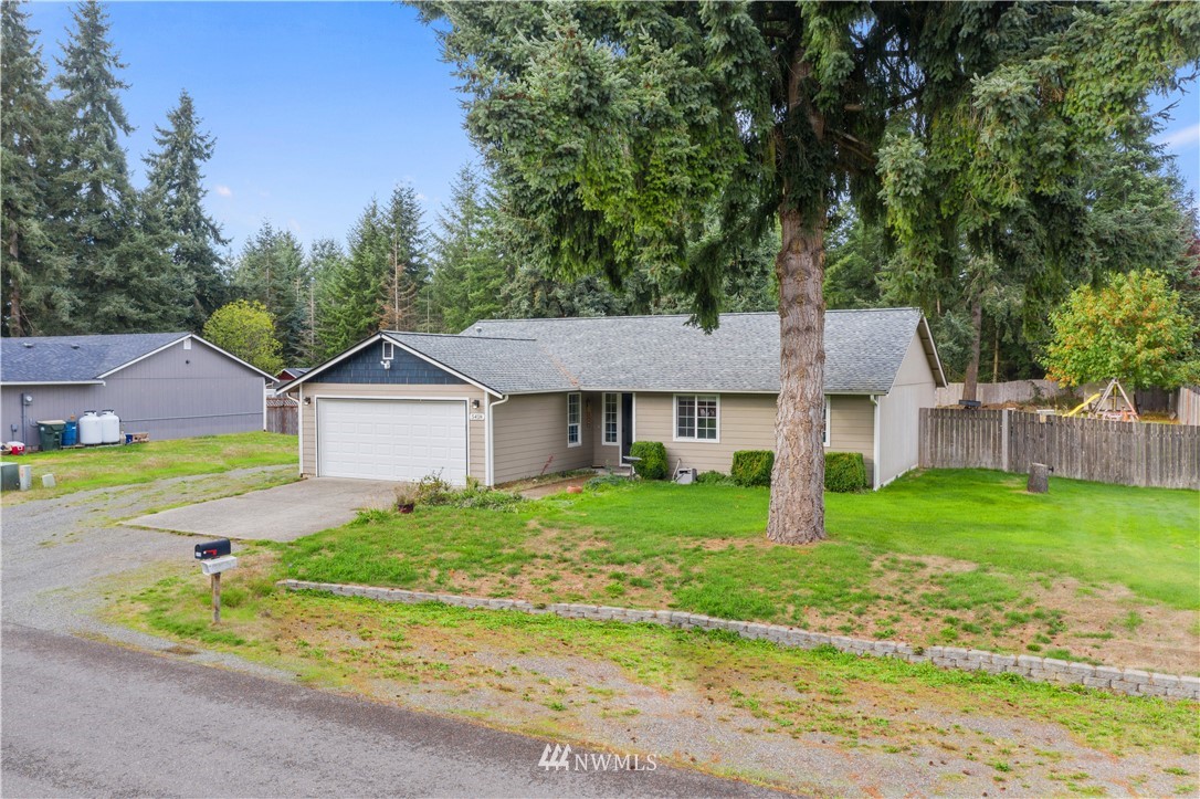 5418 187th Court Southwest Rochester, WA 98579 - Photo 24 of 24 front view of a house and a yard