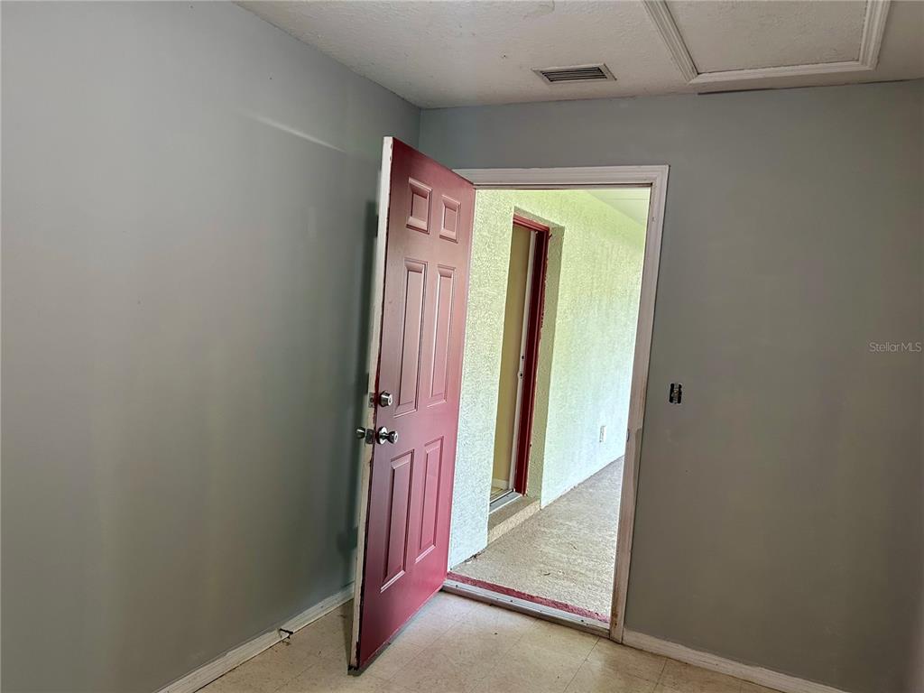 209 1st Avenue Wauchula, FL 33873 - Photo 25 of 27 a view of a hallway
