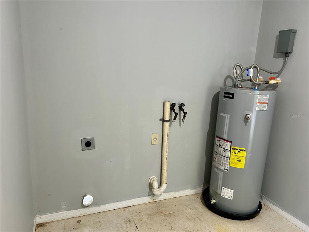 209 1st Avenue Wauchula, FL 33873 - Photo 26 of 27 a view of water heater room