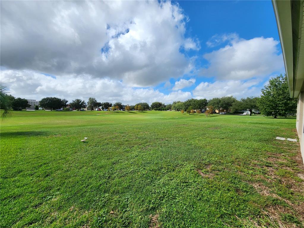 4740 Southwest 41st Street Ocala, FL 34474 - Photo 5 of 31 a view of a green field