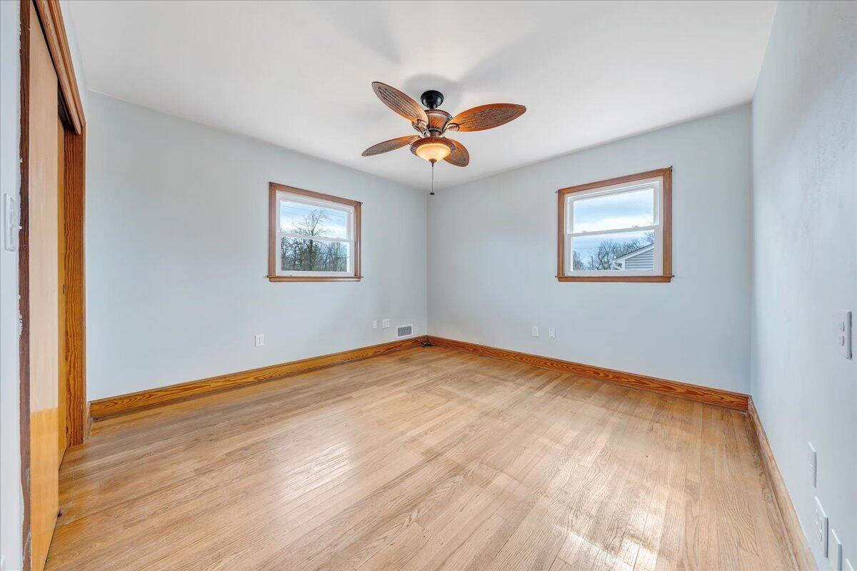 1090 Garner Road Vinton, VA 24179 - Photo 11 of 23 a view of empty room with wooden floor